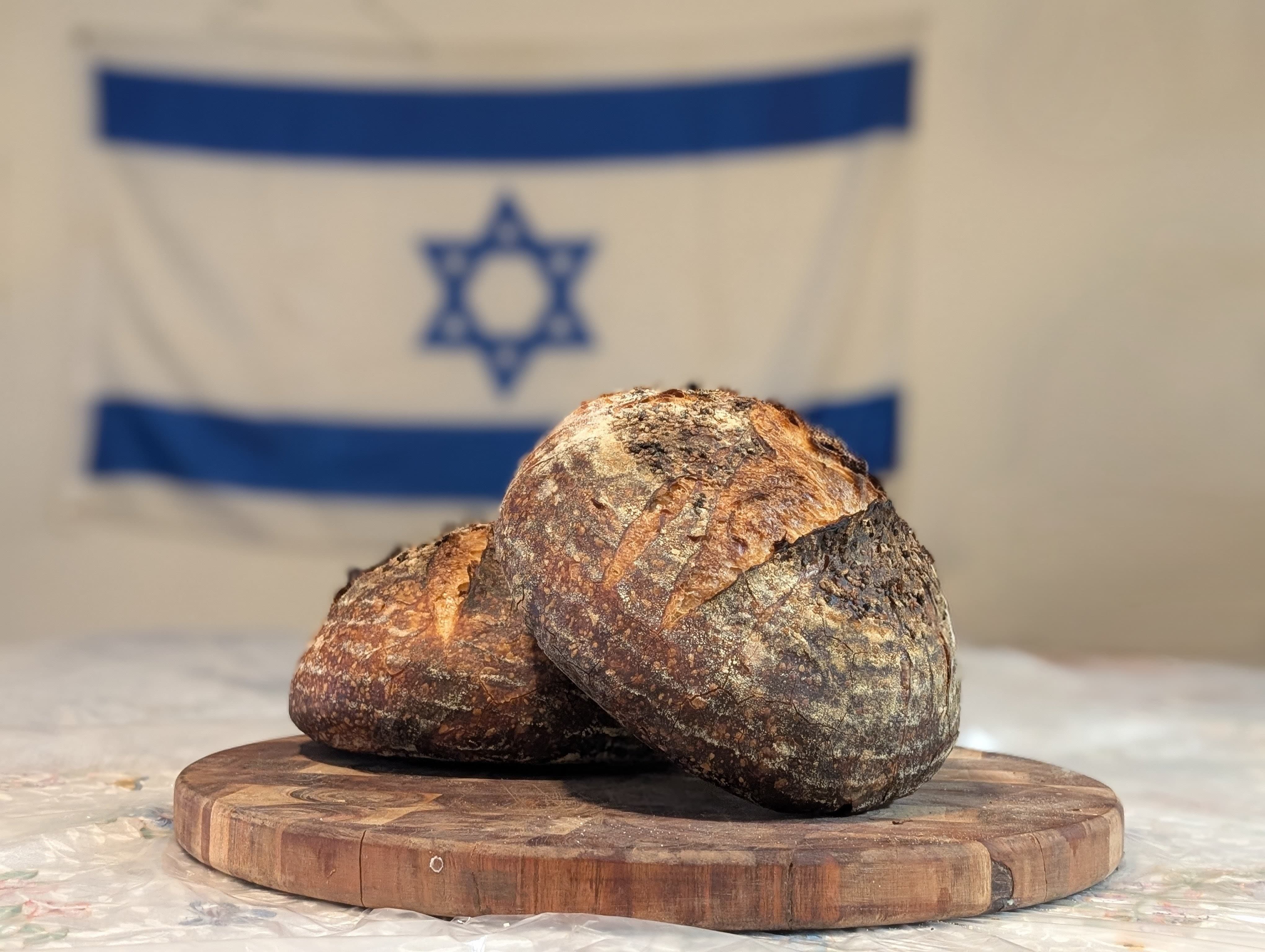 Sourdough loaves with Israeli flag pattern